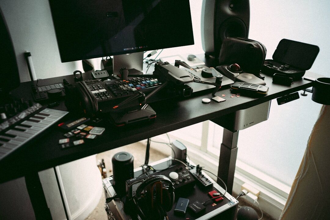 Video editor working at a multi-monitor editing workstation